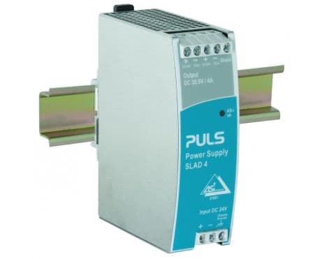 Puls SLAD4.100 PULS SLAD4.100 is a power supply unit designed with a PFC compliant to EN 61000-3-2 standards, featuring a DC-OK relay contact output. It serves as an AS-Interface power supply unit (PSU) and DC/DC-Converter, encased in a robust metal housing. This unit offers screw-clamp connections for secure installation and measures W40mm x H124mm x D102mm. It operates on a supply voltage range of 18Vdc-31.4Vdc, with a nominal 24Vdc, and delivers a rated current of 4A at 30.6Vdc, incorporating a derating curve from 3W/+60°C to +70°C. Designed for DIN rail mounting, it can function within an ambient air temperature range of -25°C to +70°C. The SLAD4.100 has a net width of 40 mm and a peak inrush current consumption of 1.8A. It is compatible with DC networks only and includes protection functions against output overvoltage (up to 36Vdc max.), with an active input inrush current limiter, and overload/short-circuit conditions (min. 5A/max. 12A current). Series or parallel operation is not supported. The output voltage is fixed at 30.6Vdc, with an efficiency of 0.905 at 24Vdc input. Power dissipation/losses are 12.7W at 24Vdc input with full output load. The unit features a 650ms start-up delay, a 100ms rise time under nominal input with constant full current load and 0mF load capacitance, and a 200ms rise time with 5mF load capacitance. Ripple is maintained at 50mVpp across a frequency range of 20Hz to 20MHz at 50Ω. SLAD4.100 on Powermatic Associates
